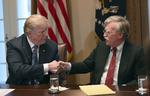 Både Donald Trump  og John Bolton (højre) er indædte modstandere af Iran-aftalen, som under præsident Obamas ledelse blev forhandlet på plads i 2015. Susan Walsh/AP