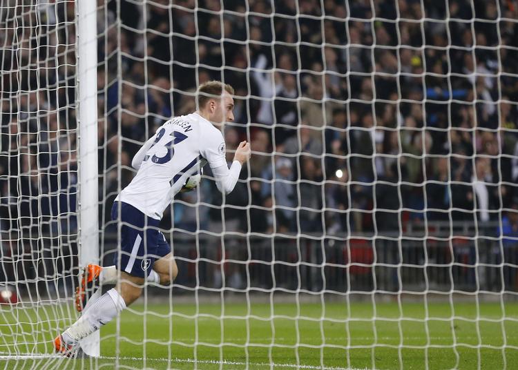 Et af sine tre mål i den forgangne måned scorede Christian Eriksen mod Manchester City, der dog vandt kampen. Frank Augstein/AP