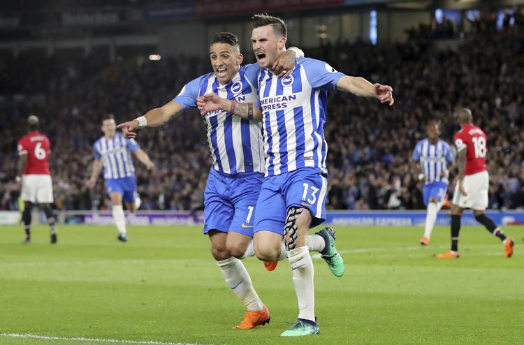 Pascal Gross vblev matchvinder for oprykkerne, der med sejren bookede billet til endnu en sæson i Premier League.  Gareth Fuller/AP