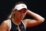  Caroline Wozniacki er færdig i Madrid efter en gruslektion hos Kiki Bertens.  Juan Medina/Ritzau Scanpix
