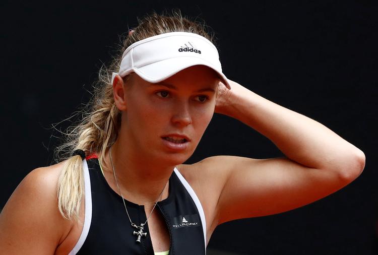  Caroline Wozniacki er færdig i Madrid efter en gruslektion hos Kiki Bertens.  Juan Medina/Ritzau Scanpix