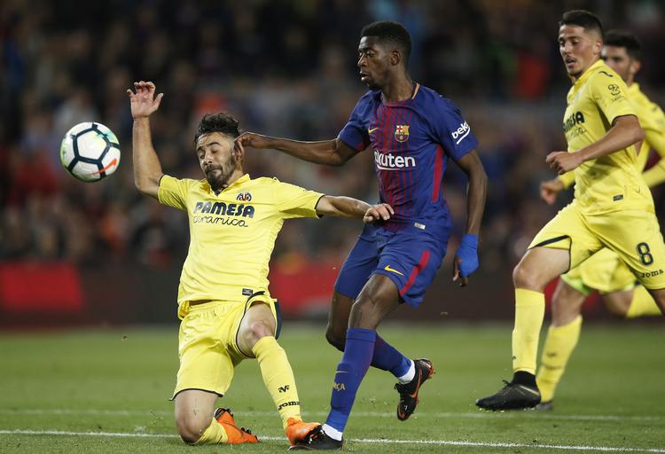 Ousmane Dembele var involveret i det første mål og scorede de to sidste, der var hans andet og tredje ligamål for Barcelona i denne sæson. Manu Fernandez/AP