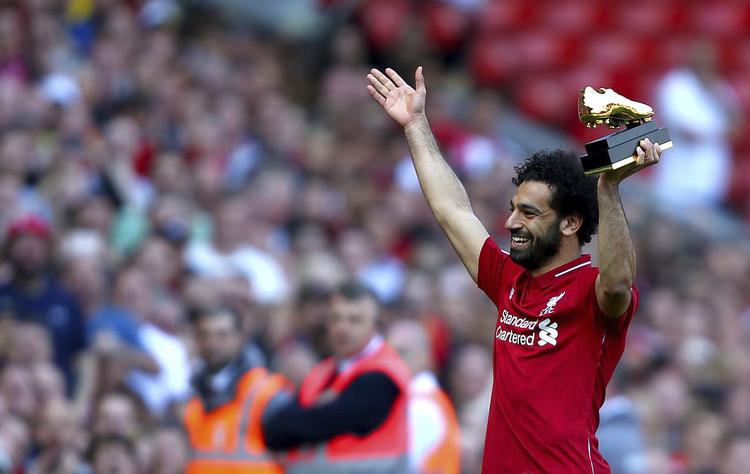 Liverpools Mohamed Salah, der her kan løfte sin Golden Boot, var søndag med til at sikre sin klubs fjerdeplads og dermed en billet til næste sæsons Champions League. Sunday, May 13, 2018. (Dave Thompson/PA via AP)
   Dave Thompson/AP