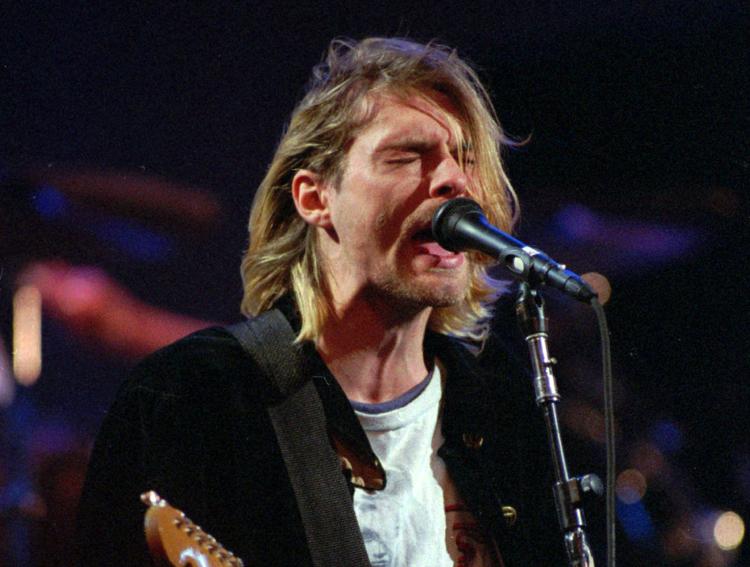 Kurt Cobain døde 5. april 1994 af et skud i hovedet. Politiet har konkluderet, at det var selvmord.  Robert Sorbo/AP