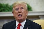 Den amerikanske præsident, Donald Trump, lover Nordkorea økonomisk fremgang, hvis landet går med til atomnedrustning. Til gengæld truer han med udslettelse, hvis ikke Nordkorea accepterer en aftale. Evan Vucci/AP