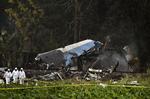 Boeing 737-flyet fra det mexicanske selskab Global Aerolineas Damojh havde 110 mennesker om bord, da det styrtede ned i en plantage uden for Cubas hovedstad, Havana.
   Ramon Espinosa/AP