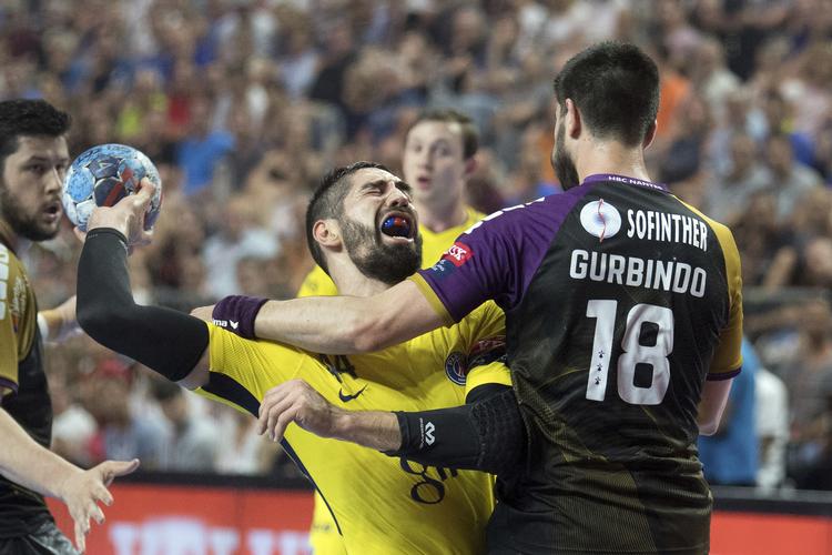 
    Gurbindo Martinez fra Nantes havde godt fat i  Nikola Karabatic og de øvrige PSG-stjerner.  Federico Gambarini/AP