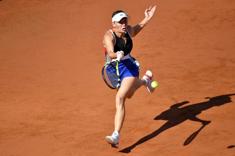 Caroline Wozniacki nåede sidste år kvartfinalen ved French Open. Siden har hun vundet karrierens første grand slam-turnering. Andreas Solaro/Ritzau Scanpix