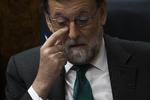 Spaniens konservative premierminister, Mariano Rajoy og hans regering er tæt på at falde. Francisco Seco/AP