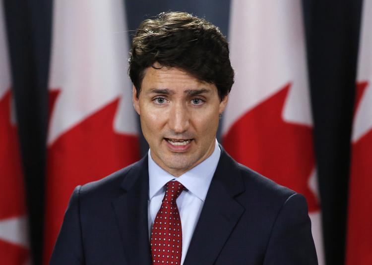 Den canadiske premierminister, Justin Trudeau, sagde torsdag på en pressekonference, at det uundgåeligt vil være føre til at modreaktioner, at USA har lagt straftold på import af stål og aluminium fra Canada, Mexico og EU.
 Patrick Doyle/AP