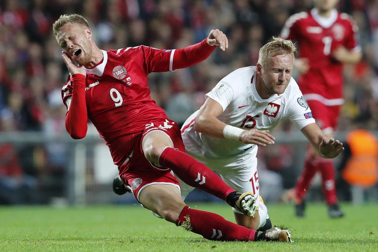 3 af Kamil Gliks 58 landskampe har været mod Danmark, senest i Parken i 2017, da polakken var i nærkamp med Nicolai Jørgensen. Jens Dresling/POLFOTO