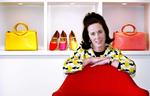 Kate Spade blev i 1990'erne kendt for sine kollektioner af håndtasker. Bebeto Matthews/AP