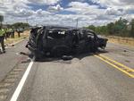 Der var angiveligt 14 personer i bilen, da den forulykkede og rullede flere gange rundt.  David Caltabiano/AP