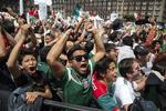 Der blev hoppet igennem i Mexico By, da Mexico i går slog Tyskland ved fodbold-vm. Men et jordskælv ... det frembragte den meget hoppen alligevel ikke. 
   Anthony Vazquez/AP