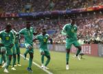 I femte forsøg formåede et afrikansk hold at få point, da Senegal slog Polen med 2-1.
   Eduardo Verdugo/AP