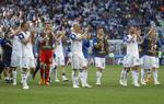 De islandske spillere fejrede det uafgjorte resultat mod Argentina, som var det en sejr.  Victor Caivano/AP