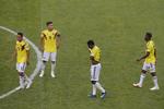 De colombianske spillere var forståeligt skuffede efter nederlaget mod Japan. Vadim Ghirda/AP