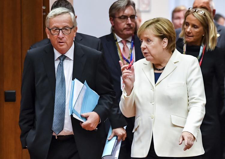 Det er kansler Angela Merkel og kommissionsformand Jean-Claude Juncker, der står i spidsen for dagens minimalistiske topmøde. Arkivfoto Geert Vanden Wijngaert