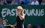 Caroline Wozniacki deltager i denne uge i en turnering i Eastbourne i England, hvor hun er videre til 3. runde og skal i kamp igen onsdag eller torsdag.  Glyn Kirk/Ritzau Scanpix