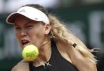 Caroline Wozniacki er kommet i gang på græsset før det kommende Wimbledon, og onsdag tog hun sin første sejr i Eastbourne.
   Alessandra Tarantino/AP