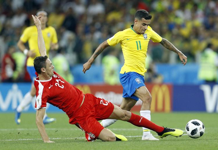 Philippe Coutinho leverede kampens detalje, da han spillede Paulinho fri til 1-0-scoringen. Ellers var der ikke alt for meget magi over Brasilien. Victor R. Caivano/AP