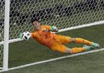  Eiji Kawashima leverede to supervigtige redninger for Japan.  Themba Hadebe/Ritzau Scanpix