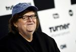 Filmen handler om, »hvordan fanden vi havnede her, og hvordan vi kommer ud«, forklarer Moore med henvisning til den politiske virkelighed i USA. Evan Agostini/AP