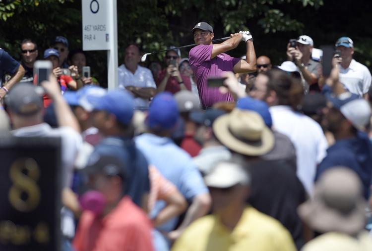 Der er som altid masser af opmærksomhed, når Tiger Woods stiller op til en turnering, og The National er ingen undtagelse.

   Nick Wass/AP
