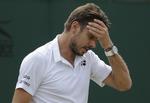 Wimbledon er den eneste grandslam-turnering     Stan Wawrinka mangler at vinde, men den knæopererede schweizer er ude af dette års turnering. Ben Curtis/AP