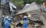 Jordskred har ramt en by i Hiroshima regionen.   Sadayuki Goto/AP