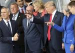 
    USA's præsident Donald Trump kræver, at Nato-landene senest i 2024 bruger to procent af BNP på militæret.  Ludovic Marin/AP