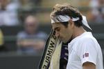 Roger Federer må komme tilbage om et år, hvis han vil have sin 9. titel i Wimbledon.   Ben Curtis/Ritzau Scanpix