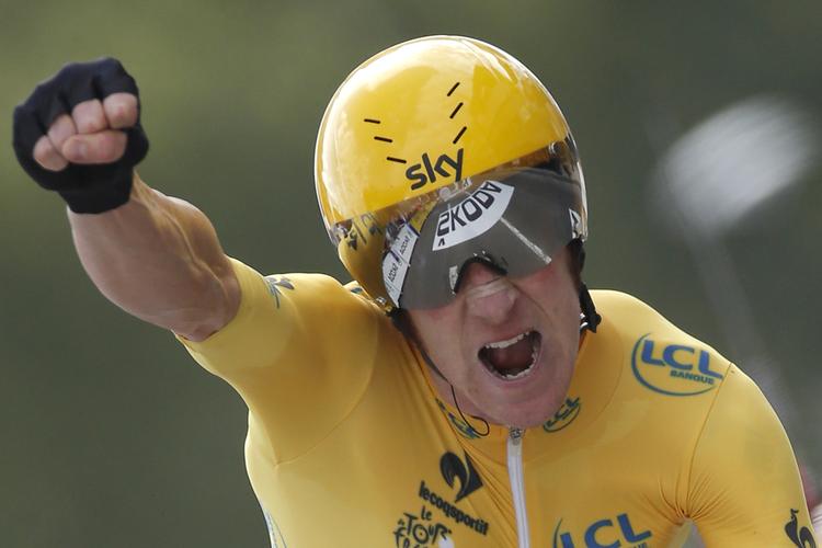   Bradley Wiggins jubler efter klart at have vundet enkeltstartenm til Chartres og dermed også Tour de France sammenlagt.
 Laurent Rebours/AP