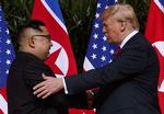 USA's præsident, Donald Trump mødtes med Nordkoreas leder, Kim Jong-un 12. juni.  Evan Vucci/AP
