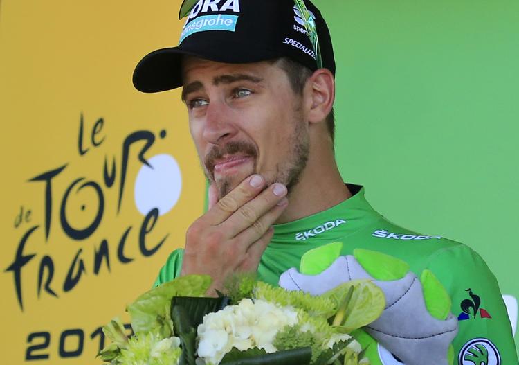 Verdensmesteren Peter Sagan synes at se betænkelig ud i den grønne pointtrøje, men det er nu nok en tilfældighed, for sloveneren har hidtil struttet af selvtilld.
   Peter Dejong/AP