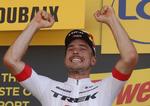 John Degenkolb jubler på podiet efter triumfen i Roubaix.
   Christophe Ena/AP