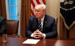 Trump havde tirsdag på pressemøde travlt med at forklare sig.  Leah Millis/Ritzau Scanpix