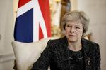 Theresa May vil selv sidde for bordenden i fremtidige forhandlinger med EU om Brexit. Matt Dunham/AP