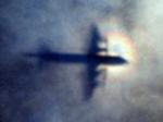 
 Trods en intens eftersøgning er vraget af det MH370 aldrig fundet- her er det et  Royal New Zealand Air Force P3 Orion, som i 2014 søgte efter det forsvundne fly.
 Rob Griffith/AP