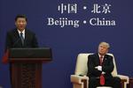 (AP Photo/Andy Wong)
   Andy Wong/AP