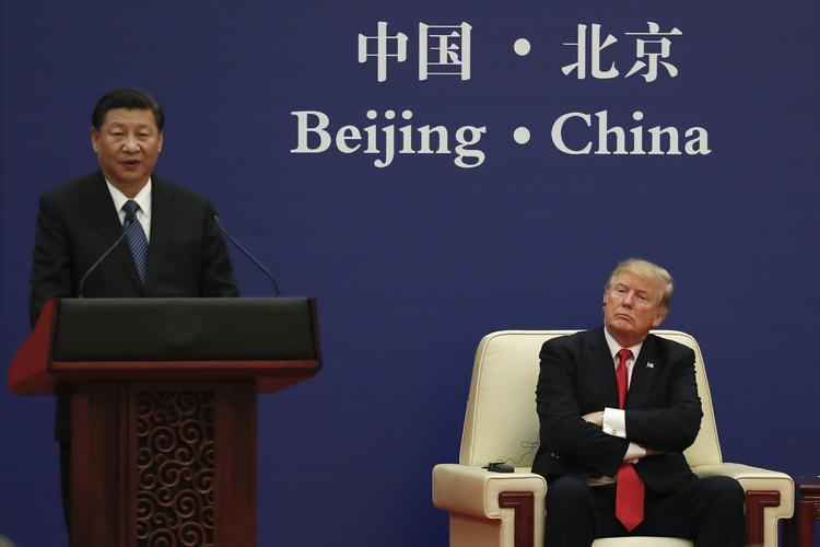 (AP Photo/Andy Wong)
   Andy Wong/AP