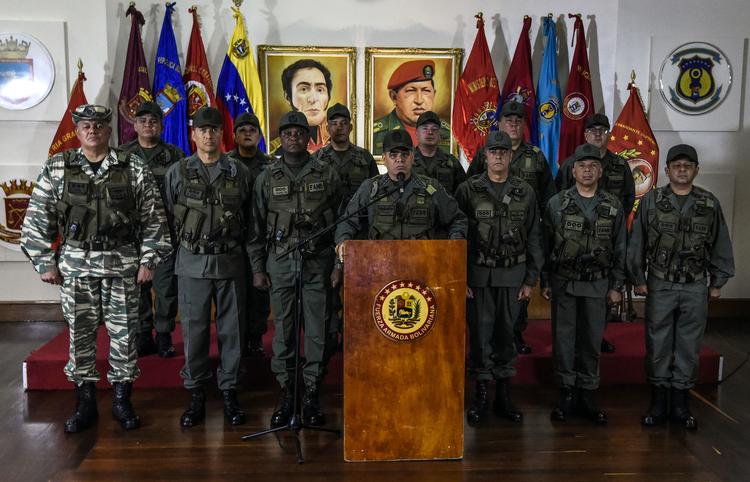
    Venezuelas forsvarsminister  Padrino Lopez holder pressekonference efter attantatet lørdag, hvor der angiveligt blev brugt droner med sprængstoffer.
 Juan Barreto/Ritzau Scanpix