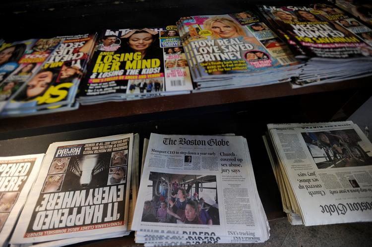 Boston Globe og en række andre amerikanske aviser har i dag dedikeret lederpladsen til et opråb mod Trump.    Joseph Prezioso/Ritzau Scanpix