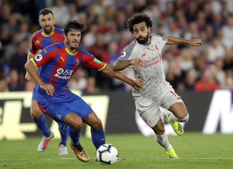 
    Mohammed Salah (th) var stærkt medvirkende til, at Liverpool vandt sin anden sejr ud af to mulige i denne sæsons Premier League. Kirsty Wigglesworth/AP