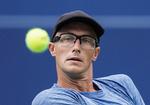 Peter Polansky fra Canada har på forunderlig vis knebet sig med i fire grand slam-turneringer på stribe uden selv at have kvalificeret sig.  Mark Blinch/AP