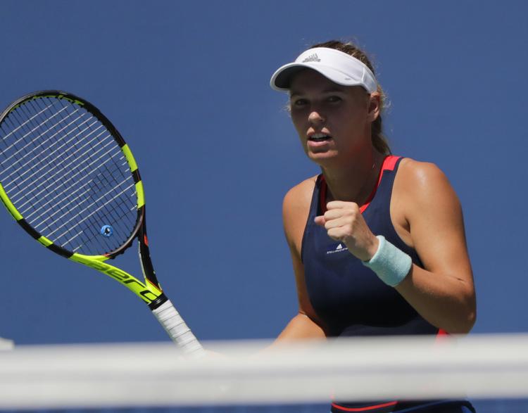 Caroline Wozniacki havde kun få problemer med Samantha Stosur, som danskeren slog klart i to sæt. Frank Franklin Ii/AP
