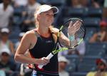 Der er god stemning i Wozniacki-lejren oven på den sikre sejr i 1. runde ved US Open, og danskeren er også storfavorit i torsdagens kamp. 
   Timothy A. Clary/Ritzau Scanpix