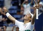 Det var et stort øjeblik, da Kei Nishikori havde fået sin revanche i fem sæt mod  Marin Cilic. Japaneren er dermed klar til en US Open-semifinale. 
   Jason Decrow/AP