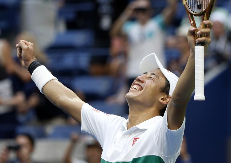Det var et stort øjeblik, da Kei Nishikori havde fået sin revanche i fem sæt mod  Marin Cilic. Japaneren er dermed klar til en US Open-semifinale. 
   Jason Decrow/AP