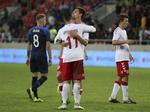 Glade danske spillere efter nederlaget mod Slovakiet.
   Ronald Zak/AP